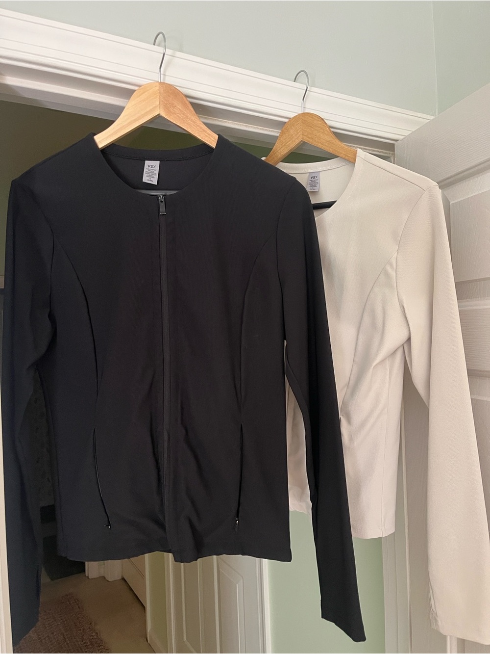 Zip-Front Black and white Victoria Secret Jackets with pockets that zip as well
